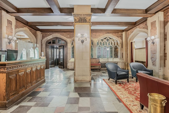 45 Tudor City Pl Unit 507, New York City, NY 10017 - community lobby with brick wall and beamed ceiling