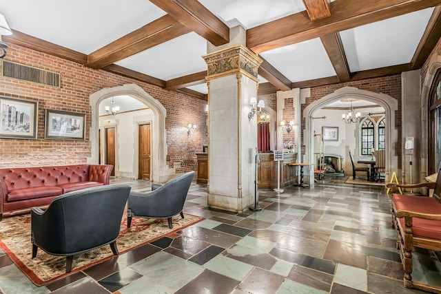45 Tudor City Pl Unit 507, New York City, NY 10017 - community lobby with brick wall and beamed ceiling