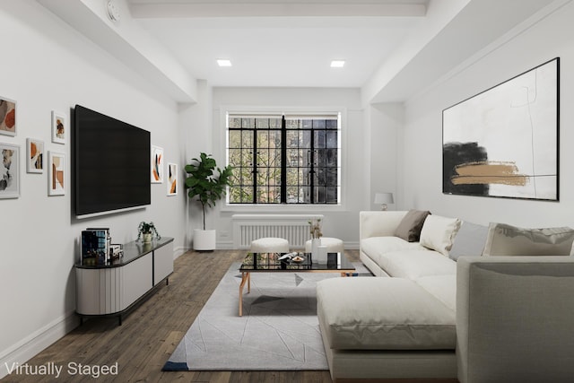 45 Tudor City Pl Unit 507, New York City, NY 10017 - living room with radiator heating unit, wood finished floors, and baseboards