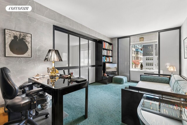 200 E 57th St Unit 14F, New York City, NY 10022 - home office featuring carpet floors