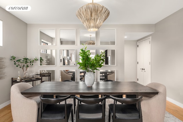 100 Barrow St Unit 5Cloft, New York City, NY 10014 - dining room featuring baseboards and light wood-type flooring