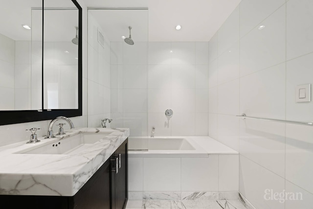 333 Rector Pl Unit 805, New York City, NY 10280 - full bathroom with a bath, vanity, tile walls, a shower, and recessed lighting