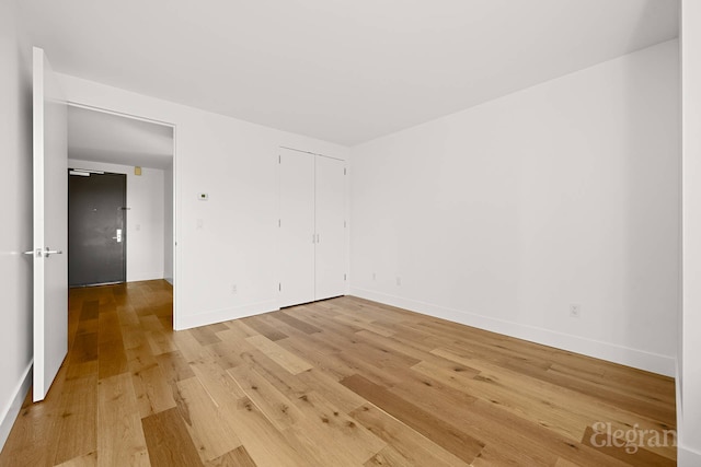 333 Rector Pl Unit 805, New York City, NY 10280 - spare room featuring light wood-type flooring and baseboards