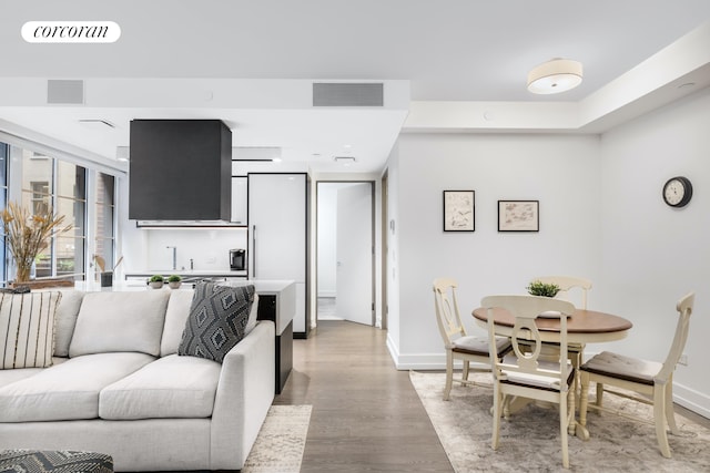70 Charlton St Unit 2G, New York City, NY 10014 - living room featuring light wood-style flooring and baseboards