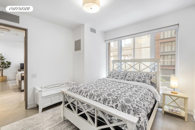 70 Charlton St Unit 2G, New York City, NY 10014 - bedroom featuring light wood finished floors