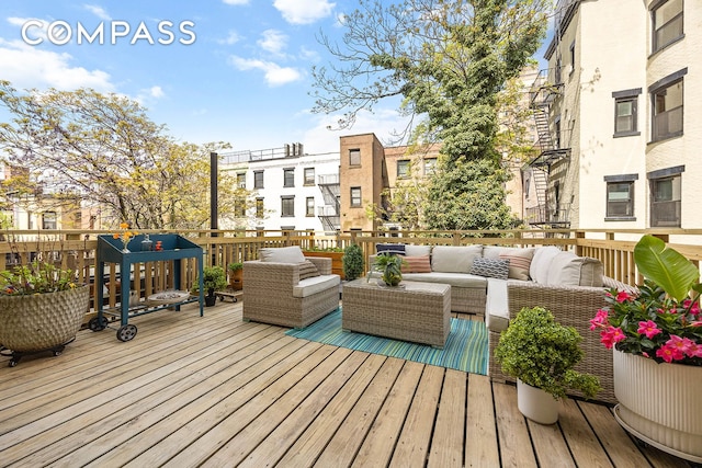 wooden deck featuring an outdoor living space