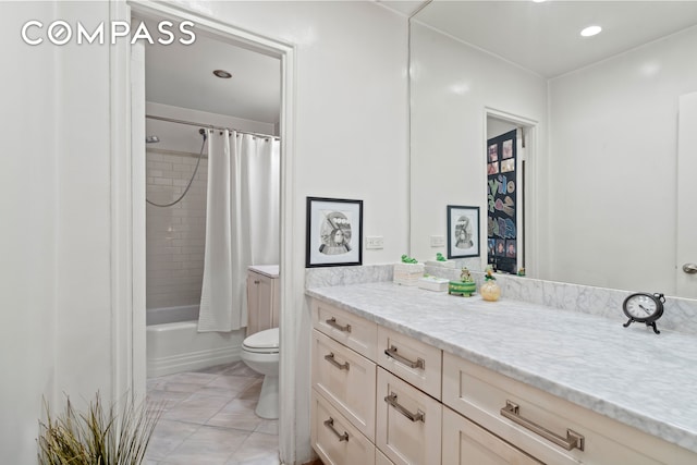 bathroom with recessed lighting, vanity, shower / bath combo, and toilet