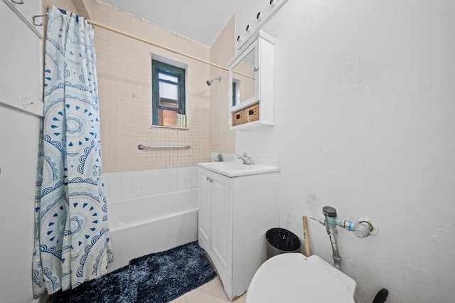 34-41 78th St Unit 5-E, New York City, NY 11372 - bathroom with shower / bath combo, vanity, toilet, and tile patterned floors