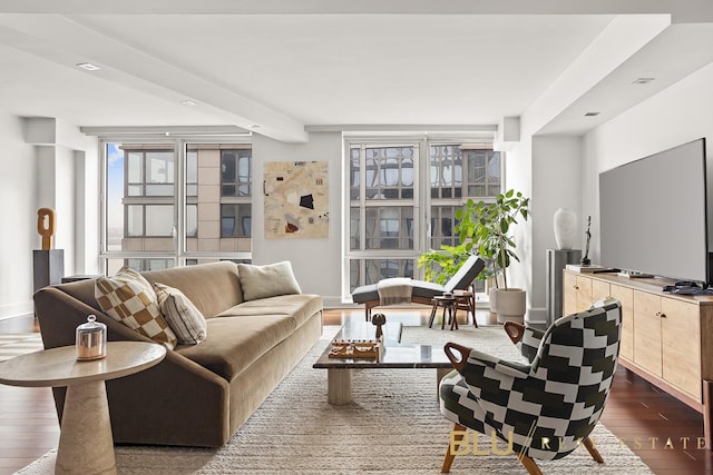 living room with baseboards, recessed lighting, and dark wood finished floors