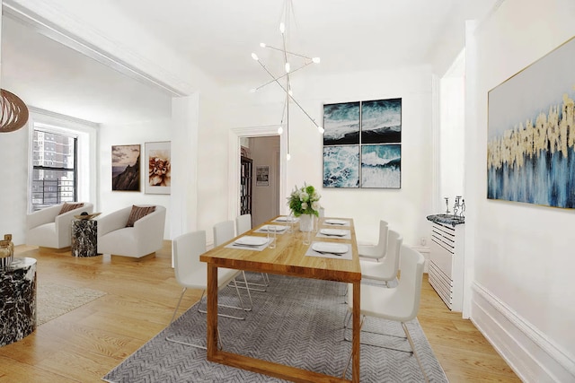 dining room with light wood-style floors