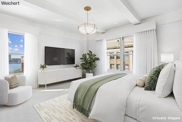 bedroom with carpet and beam ceiling