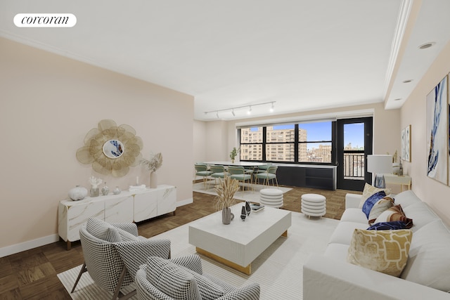 living room featuring baseboards and visible vents