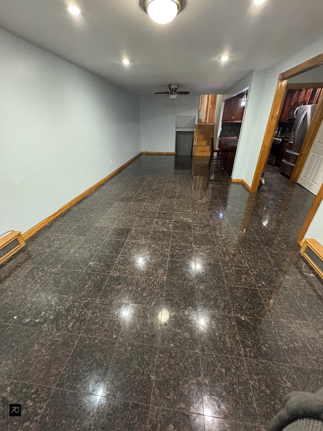 1264 E 73rd St, New York City, NY 11234 - unfurnished living room featuring baseboards, granite tiled floors, recessed lighting, and ceiling fan