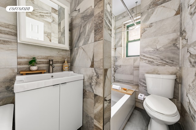 full bath with tile walls, toilet, and vanity