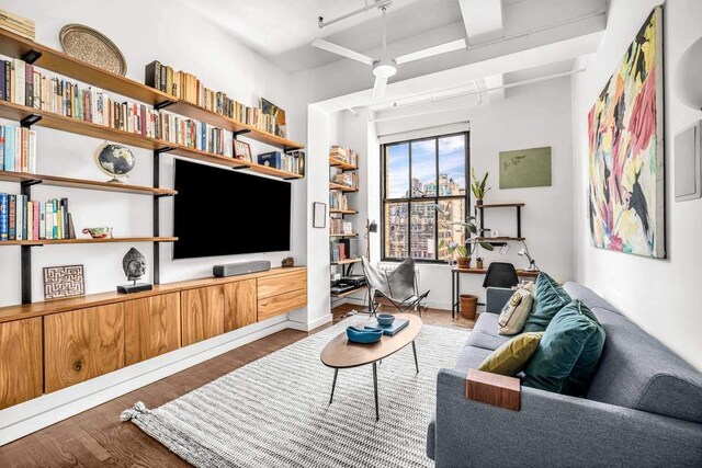 living area with wood finished floors