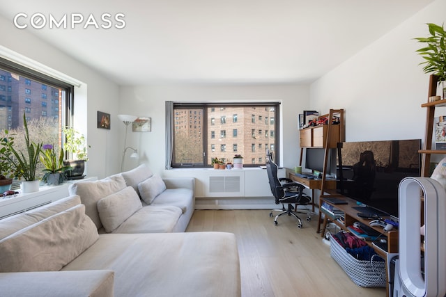 1330 5th Ave Unit 6C, New York City, NY 10026 - home office featuring light wood-style floors