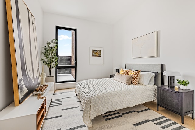 bedroom with light wood-style flooring