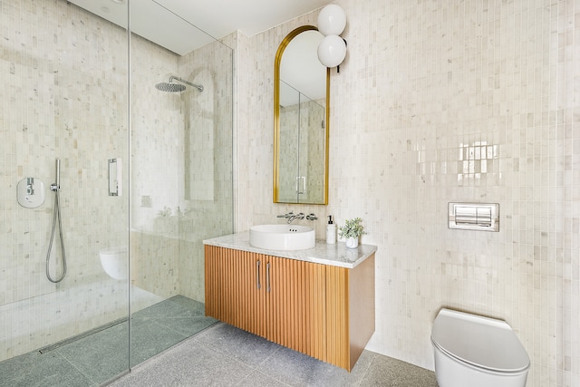 bathroom featuring walk in shower, toilet, tile walls, and vanity