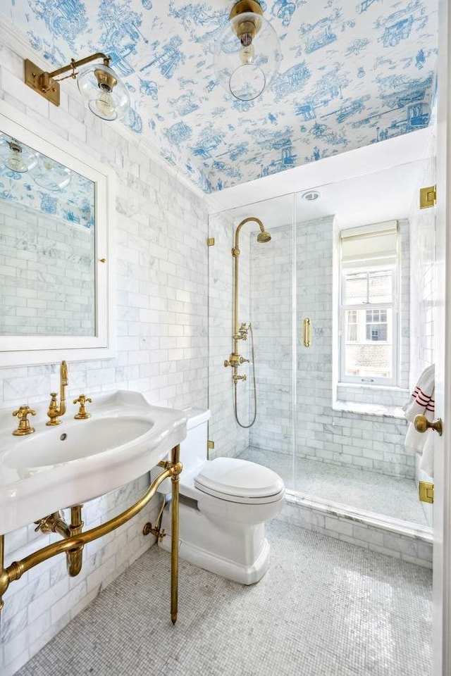 bathroom with tile patterned flooring, a shower stall, and toilet
