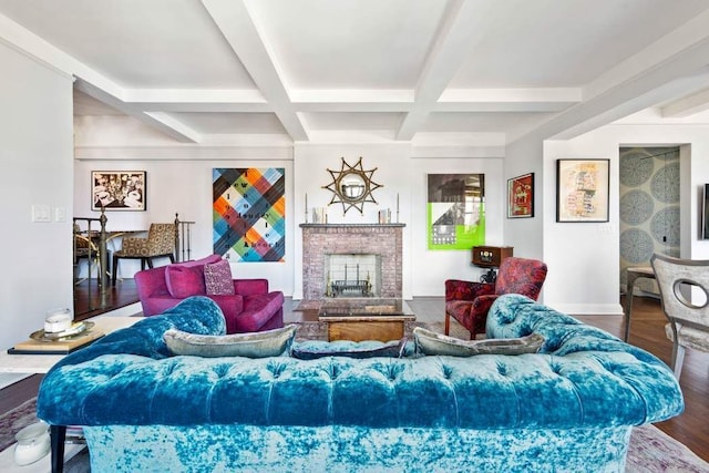 living room featuring a fireplace, baseboards, wood finished floors, beamed ceiling, and coffered ceiling