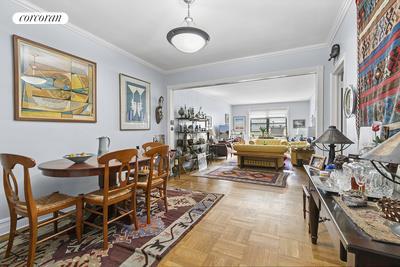 dining area with crown molding and visible vents