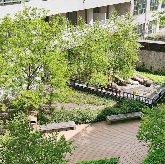 view of property's community featuring a wooden deck