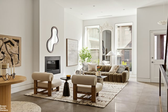49 E 126th St, New York City, NY 10035 - living area featuring a glass covered fireplace