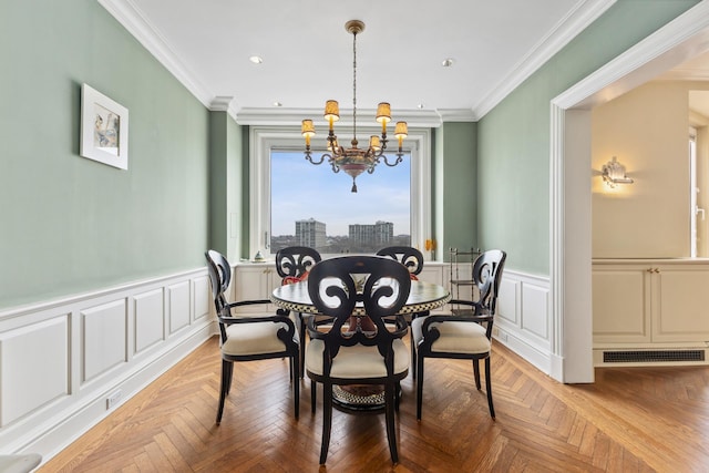 1 E End Ave Unit 8A, New York City, NY 10075 - dining space featuring a chandelier, crown molding, a decorative wall, and recessed lighting