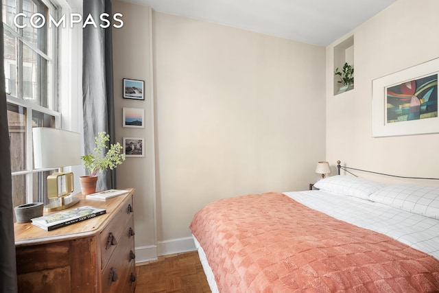 bedroom with baseboards