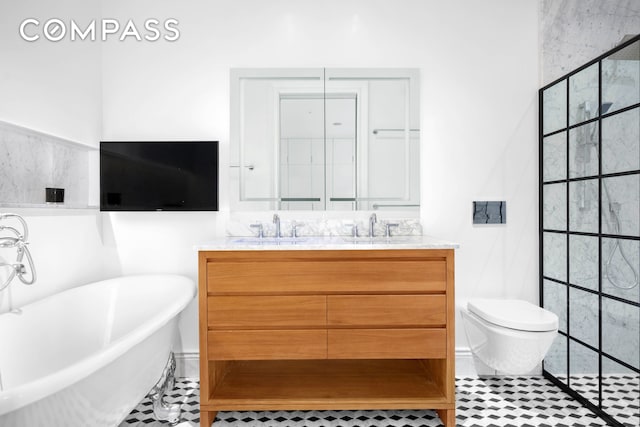 full bath with a sink, a soaking tub, a tile shower, and double vanity