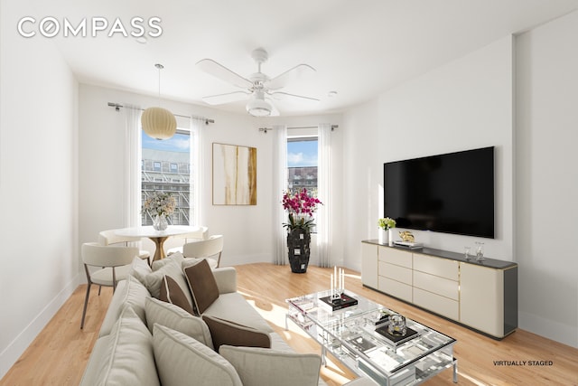 1878 Adam Clayton Powell Jr Blvd Unit 52, New York City, NY 10026 - living area with ceiling fan, light wood-style flooring, and baseboards