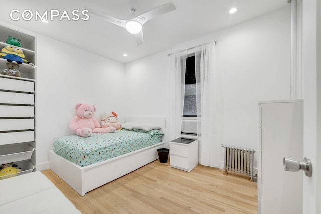 1878 Adam Clayton Powell Jr Blvd Unit 52, New York City, NY 10026 - bedroom with radiator, wood finished floors, ceiling fan, and recessed lighting