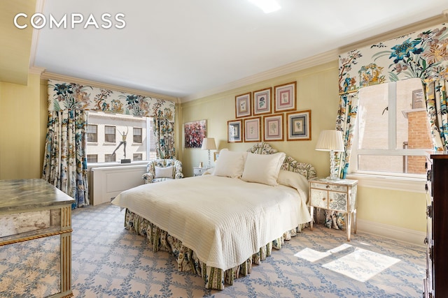 bedroom with baseboards and ornamental molding