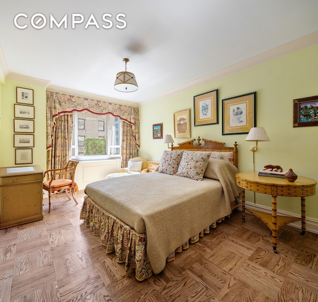 bedroom featuring baseboards and ornamental molding