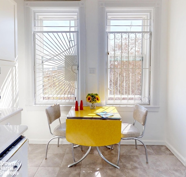 188 W 135th St Unit 5W, New York City, NY 10030 - dining area with baseboards