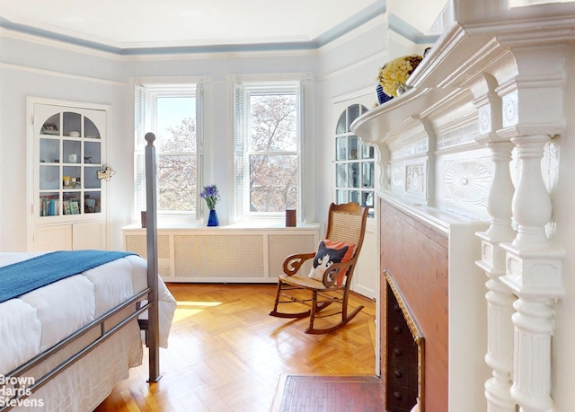 188 W 135th St Unit 5W, New York City, NY 10030 - bedroom with radiator heating unit and crown molding