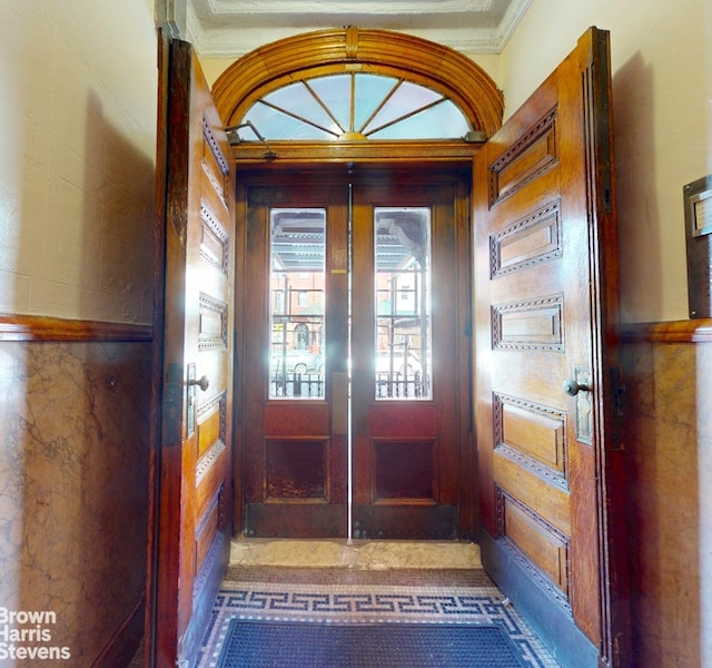 188 W 135th St Unit 5W, New York City, NY 10030 - doorway to outside featuring ornamental molding and french doors