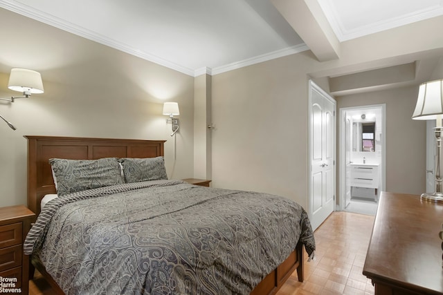 bedroom featuring ensuite bathroom and ornamental molding