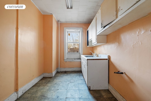125 Stryker St, New York City, NY 11223 - laundry area featuring cabinet space