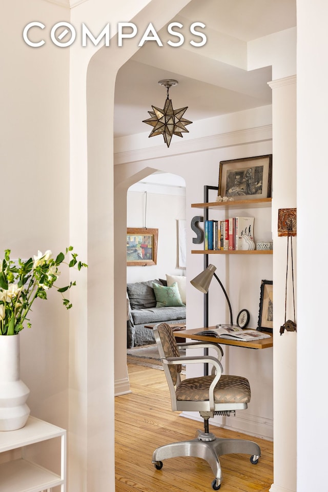 200 E 16th St Unit 5Lm, New York City, NY 10003 - hall featuring arched walkways and wood finished floors
