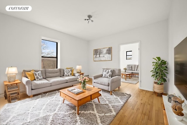 living area with light wood finished floors