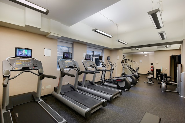 gym featuring visible vents