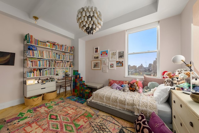 bedroom featuring wood finished floors