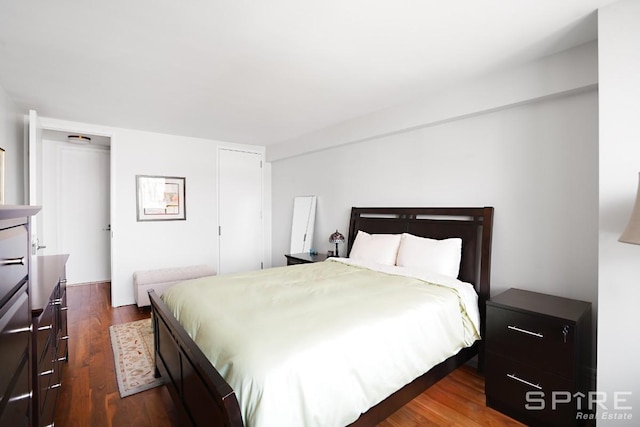 515 E 72nd St Unit 24A, New York City, NY 10021 - bedroom with dark wood-style floors
