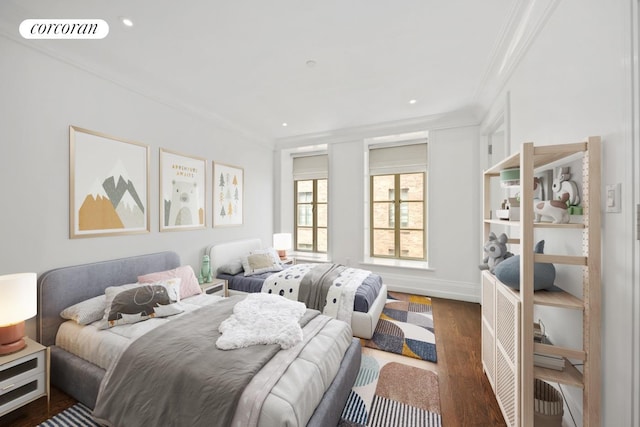 bedroom featuring visible vents, ornamental molding, baseboards, recessed lighting, and dark wood finished floors