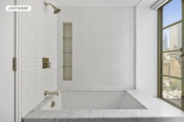 full bathroom featuring  shower combination