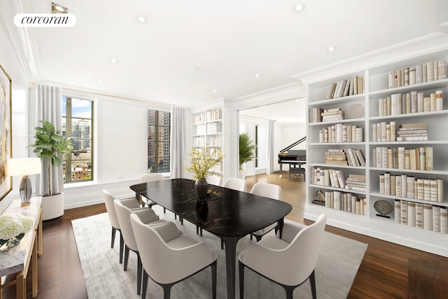 dining room with crown molding, recessed lighting, and dark wood-type flooring