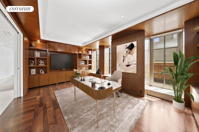 living room featuring visible vents, built in features, crown molding, and dark wood-style floors