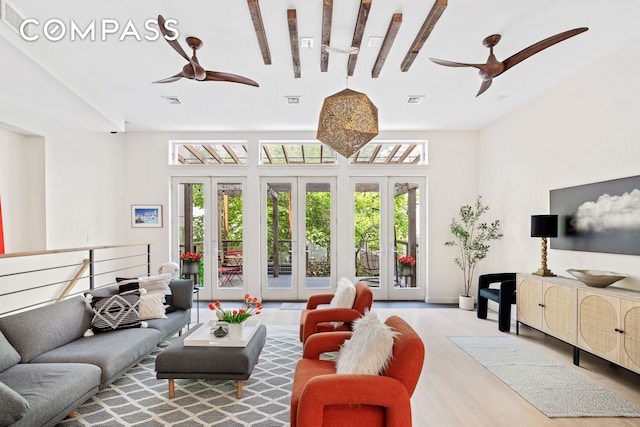 65 Jackson St, New York City, NY 11211 - living area featuring a ceiling fan, wood finished floors, and french doors