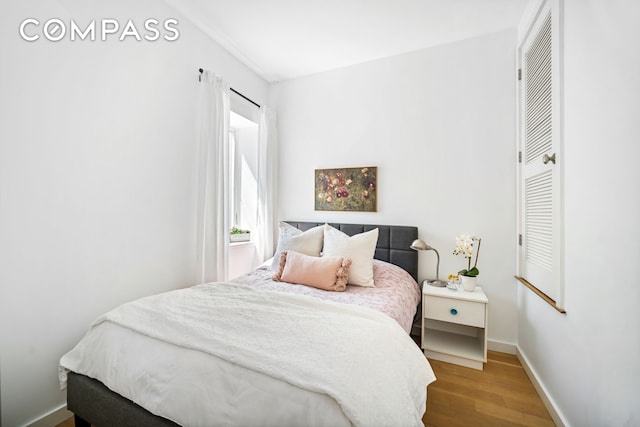 65 Jackson St, New York City, NY 11211 - bedroom featuring wood finished floors and baseboards